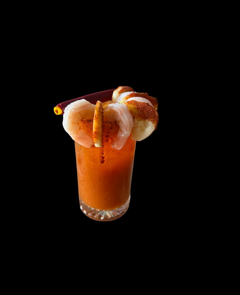 Michelada Preparada with chile rim and garnishes