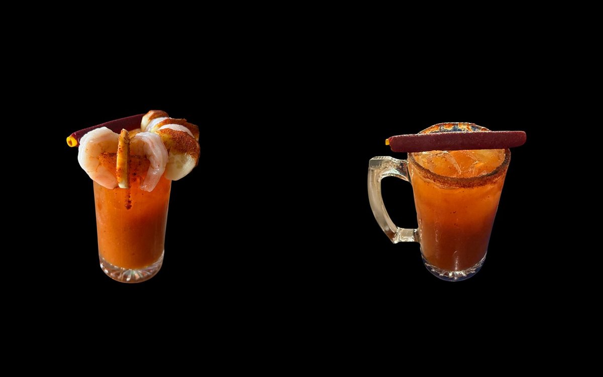 Two micheladas with chile-rimmed glasses